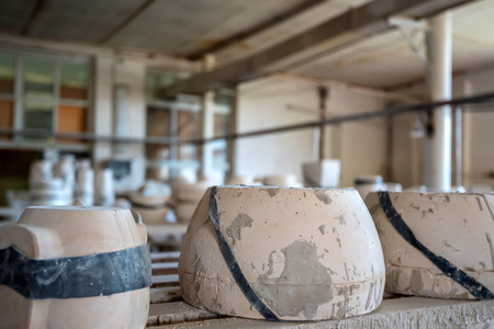 Flat earthenware blanks for productionの写真素材