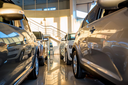 New cars at dealer showroomの写真素材