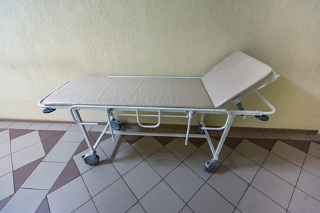 Close up empty gurney in hospitalの写真素材