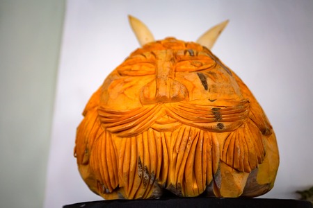 Face carved on mango fruit close upの写真素材