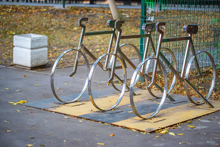Empty bike parking in shape of bicycleの写真素材