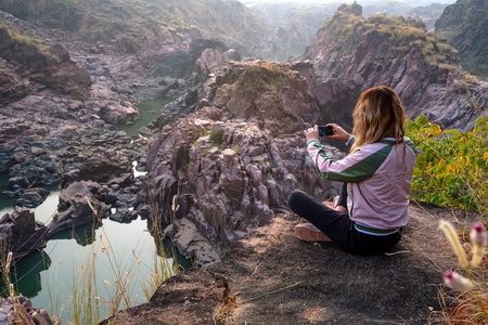 Woman hiking in Gharial Sanctuary, India