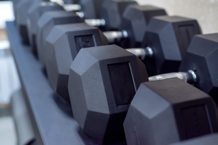 Closeup image of chrome dumbbells