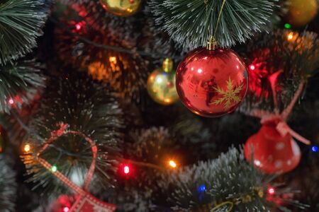 Colorful Christmas decorations on fir tree, spruce