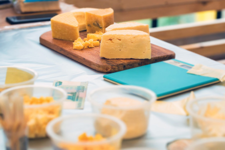 Close-up of homemade cheese at country fairの写真素材