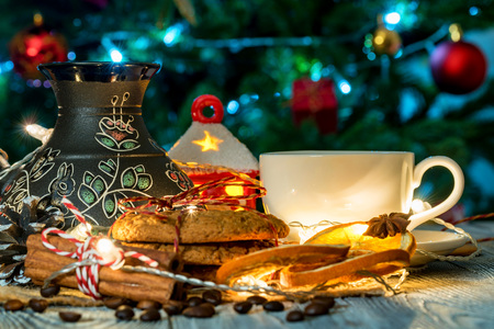 Cozy winter setting with cup of coffee and cezvaの写真素材