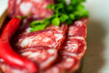 Close-up of smoked sausage and vegetablesの写真素材