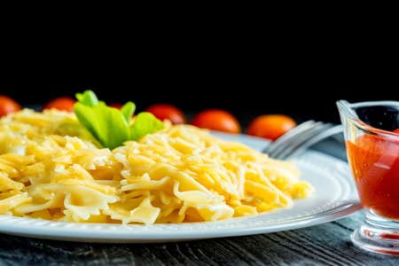 Traditional Italian pasta or fussili with cheeseの写真素材