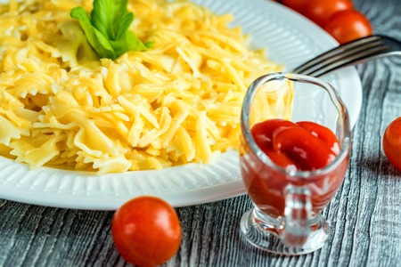 Traditional Italian pasta or fussili with cheeseの写真素材