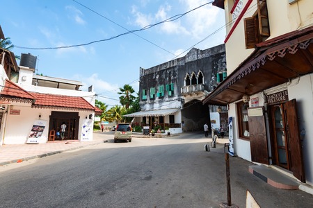 STONE TOWN, ZANZIBAR - JANUARY 9, 2015: Street of Stone Town on sunny dayのeditorial素材