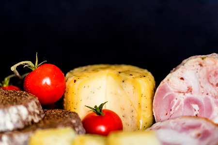 Cheese, turkey roll and vegetablesの写真素材