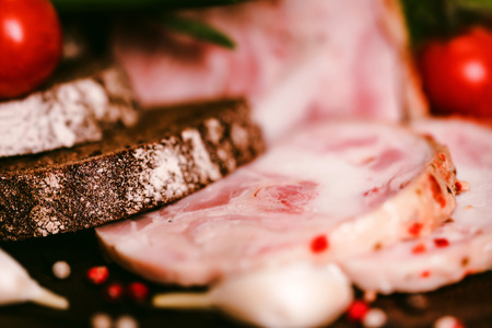 Sliced turkey roll, peppercorn and vegetables