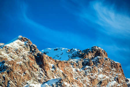 Winter mountain landscape with rocks and snow
