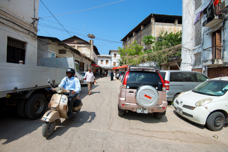 STONE TOWN, ZANZIBAR - JANUARY 9, 2015: Street of Stone Town on sunny dayのeditorial素材
