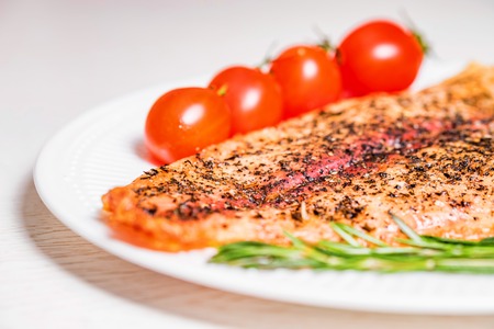 Roasted fish fillet with vegetables closeの写真素材