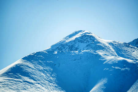 Winter mountain landscape with rocks and snowの写真素材