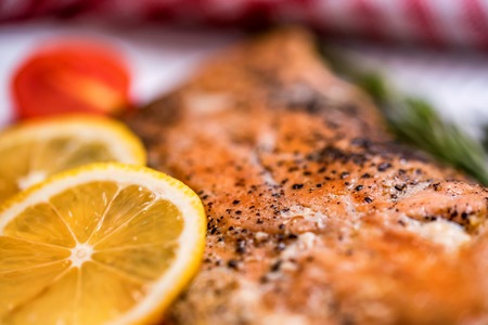 Salmon steak with vegetables close upの写真素材