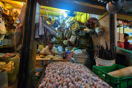 HIGUEY, DOMINICAN REPUBLIC - NOVEMBER 1, 2015: Seller in local market in Higueyのeditorial素材