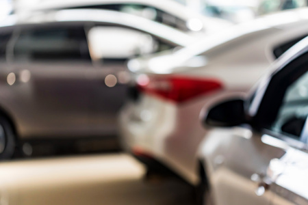 New cars at dealer showroom blurred backgroundの写真素材