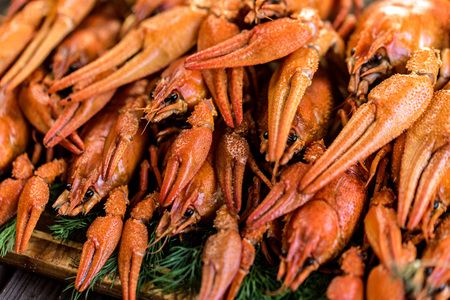 Boiled crayfish on rustic wooden backgroundの写真素材