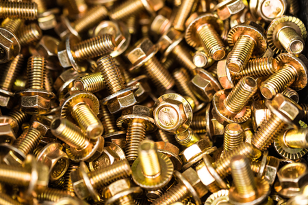 Close-up bronze bolts background