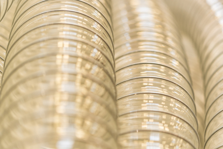 Closeup of transparent plastic corrugated pipeの写真素材