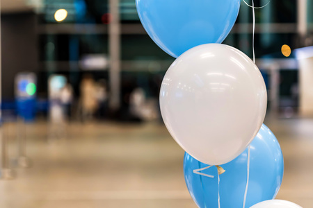 Blue and white baloons at reception hallの写真素材