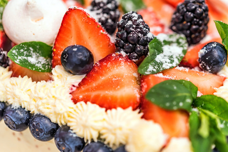 Delicious berry cake with cream closeの写真素材