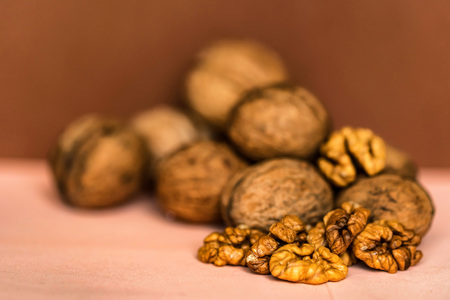 Walnuts and kernels on beige backgoundの写真素材