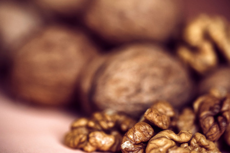 Walnuts and kernels on beige backgoundの写真素材