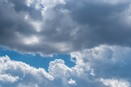 Blue sky with white clouds backgroundの写真素材