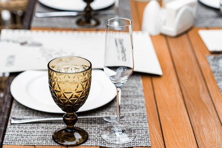 Served tables at outdoor restaurant