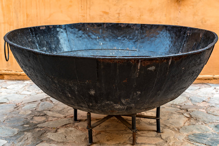 Old cauldron in Amber fort in Jaipur, India