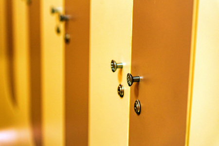 Wooden doors in sports gym locker roomの写真素材