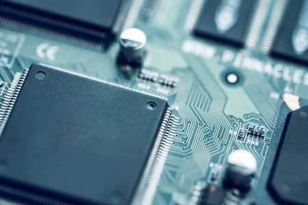 Electronic circuit board close up. Modern hi-tech background