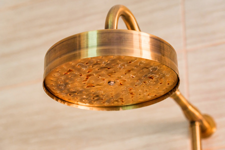 Dirty shower head with and rust on itの写真素材