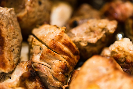 Pieces of tasty roasted meat close upの写真素材