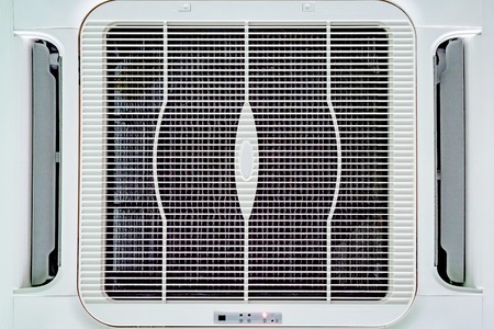 Modern office ceiling air conditioning system close