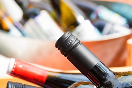 Close up of full and corked bottles of wineの写真素材