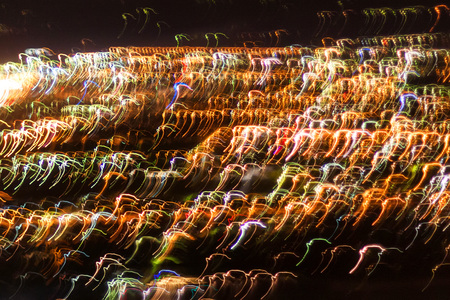 Blurred defocused lights of the evening city