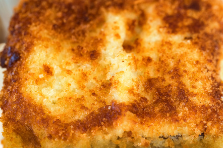 Close up view of crispy breaded fish fillet texture
