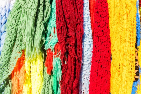 Colour knitted shawls in market close upの写真素材