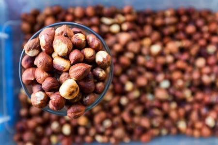 Raw peeled hazelnut kernels for sale in marketの写真素材