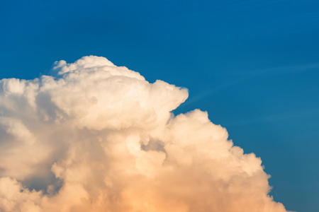 Blue sky with pinkish white clouds