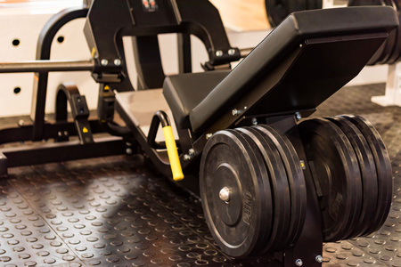 Close-up sport exercise equipment in modern gym