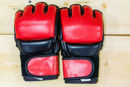 Close up two red MMA boxing glovesの写真素材