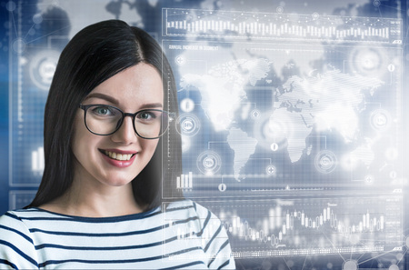 Young business lady in futuristic office. Global corporate concept