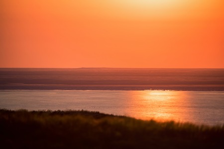 Beautiful landscape with sunset over saline lake Baskunchakの写真素材