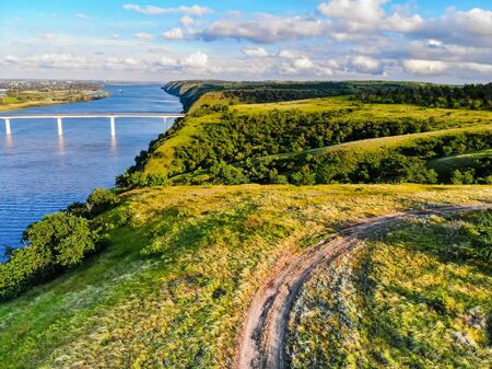 View of steppe and a modern bridge over upper river Don in Russiaの写真素材