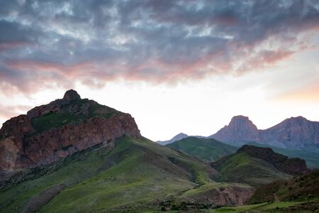 View of beautiful mountains in northern caucasus with cloudy skyの写真素材